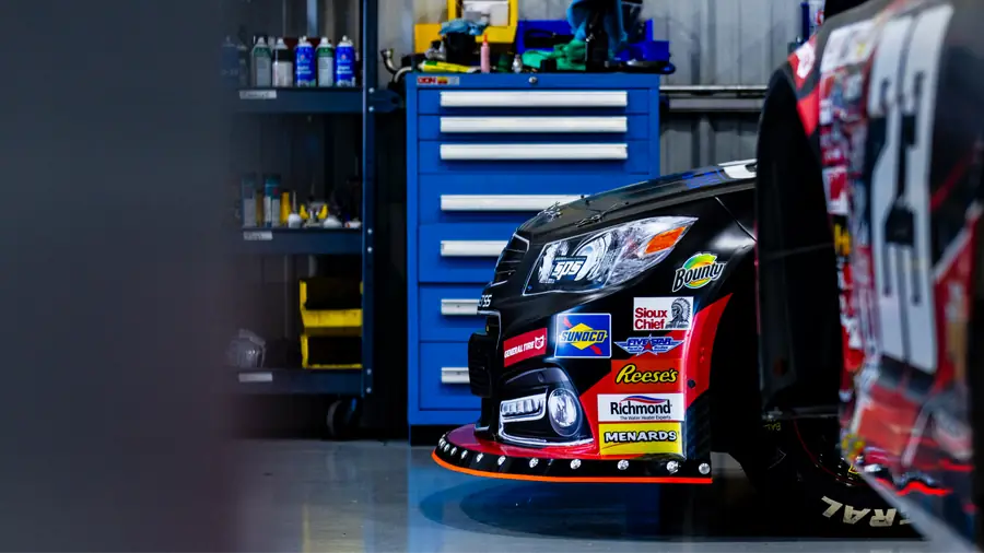 A car nose beside a toolbox in the SPS shop.